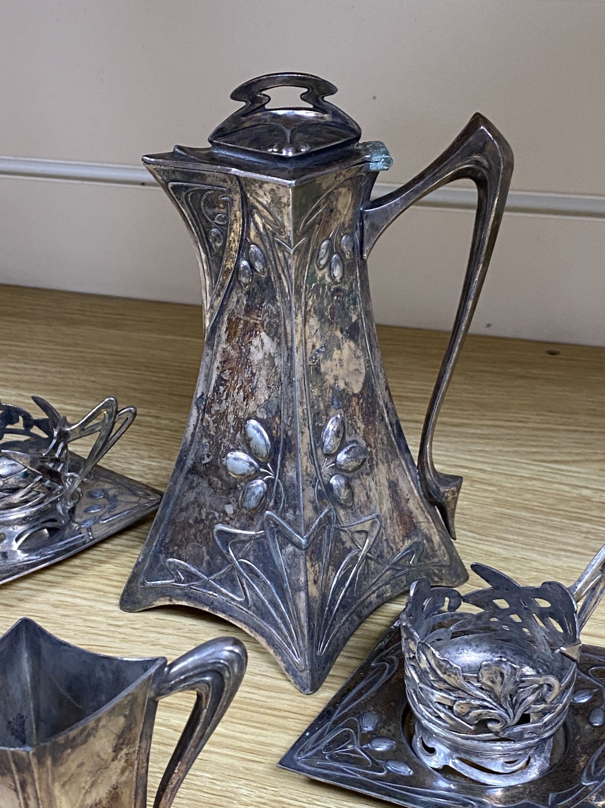 An Art Nouveau pewter coffee set etc.